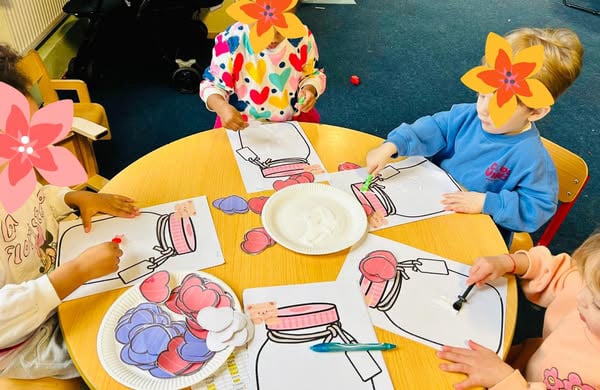 Toddlers building and creating in the open-plan toddler area